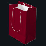 Burgundy Medium Gift Bag<br><div class="desc">Burgundy is a deep, rich color that blends dark red with undertones of purple and sometimes brown. It is often described as sophisticated, luxurious, and warm, similar to the color of red wine from the Burgundy region of France. Characteristics Hue: A purplish-red or reddish-purple that is darker and warmer than...</div>
