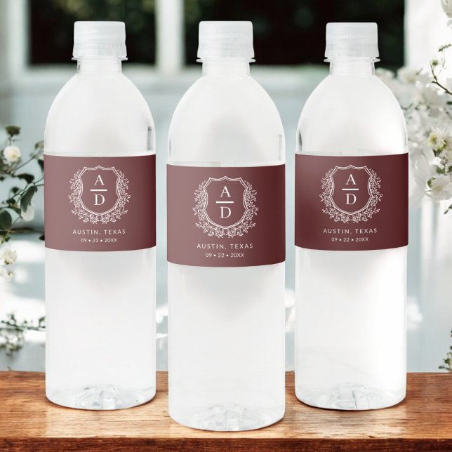 Burgundy Monogram Wedding Floral Crest Water Bottle Label (Creator Uploaded)