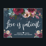 Burgundy Navy Floral Postponed Wedding Announcement Postcard<br><div class="desc">Event postponed announcement template - burgundy red navy floral change of date postcard. Chich burgundy, marsala, navy painted watercolor roses, botanical blush floral arrangement wedding design with green leaves on dark navy blue background. Feature an elegant handwritten typography design with saying „Love is Patient”. At the backing you can change...</div>