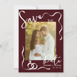 Burgundy Photo Whimsical Romantic Save the Date Magnetic Invitation<br><div class="desc">Announce your special day with this elegant burgundy photo Save the Date card featuring modern handwritten typography, delicate decorative line accents, and a romantic engagement photo layout. The deep burgundy background paired with soft white script creates a timeless and sophisticated look, making it perfect for fall, winter, or classic romantic...</div>