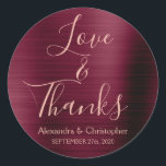 Burgundy Rose Gold Foil Love & Thanks Classic Round Sticker<br><div class="desc">Burgundy Purple - Cranberry Marsala and Rose Gold Typography Script Faux Faux Foil Metallic Elegant Love and Thanks - Thank You Favour Sticker that can be used as an Envelope Seal for a Autumn or Fall Wedding. This sticker can be customised to include your name and wedding date. This sticker...</div>
