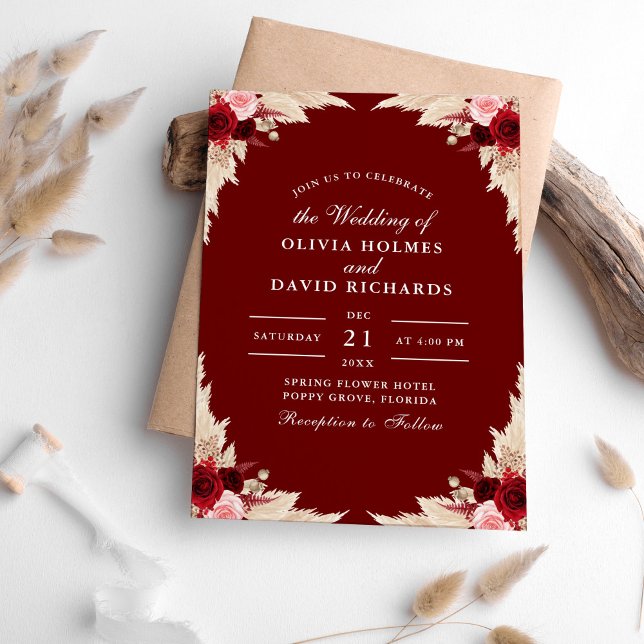 Burgundy Roses and Pampas Grass Wedding Invitation (Burgundy Roses and Pampas Grass Wedding Invitation on a table with pampas grass.)
