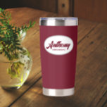 Burgundy Stylised Wedding Groomsman Name Insulated Tumbler<br><div class="desc">Gift your wedding groomsman this trendy and personalised,  stainless steel,  thermal tumbler with his name in stylised script in a white oval design. Background and script is a burgundy colour. Personalise your thermal tumbler by editing and replacing groomsman's name with desired name.</div>