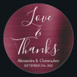 Burgundy Wedding Love & Thanks Classic Round Sticker<br><div class="desc">Burgundy Purple - Cranberry Marsala and White Typography Script Faux Faux Metal Metallic Elegant Love and Thanks - Thank You Favour Sticker that can be used as an Envelope Seal. This sticker can be customised to include your name and wedding date. This sticker is part of a matching autumn or...</div>