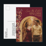 Burgundy Wildflowers Photo Wedding Save the Date Announcement Postcard<br><div class="desc">Give your loved ones advance notice of your upcoming wedding with this beautiful save the date postcard! The rustic burgundy and gold colored boho chic design features your photo in an arch shaped frame with a spray of delicate wildflowers along one side in autumn shades of burgundy, sienna, and marigold....</div>