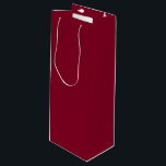 Burgundy Wine Gift Bag<br><div class="desc">Burgundy is a deep, rich color that blends dark red with undertones of purple and sometimes brown. It is often described as sophisticated, luxurious, and warm, similar to the color of red wine from the Burgundy region of France. Characteristics Hue: A purplish-red or reddish-purple that is darker and warmer than...</div>