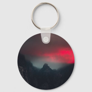 Burning clouds, fog and mountains key ring