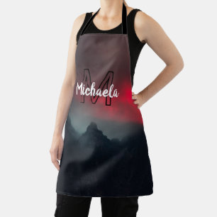 Burning clouds, fog and mountains monogram in sky apron