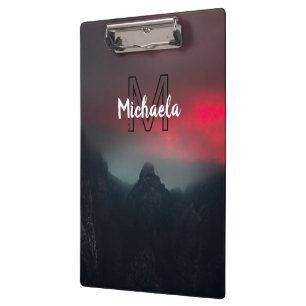 Burning clouds, fog and mountains monogram in sky clipboard