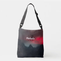 Burning clouds, fog and mountains monogram in sky
