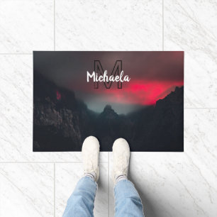 Burning clouds, fog and mountains monogram in sky doormat