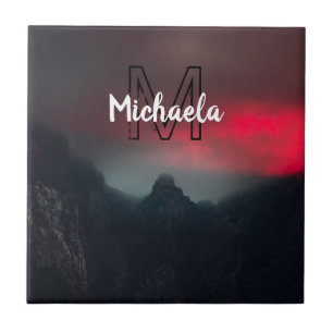 Burning clouds, fog and mountains monogram in sky tile