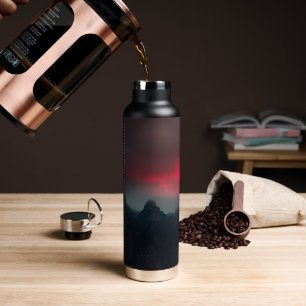 Burning clouds, fog and mountains water bottle