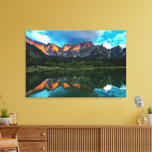 Burning sunset over the mountains at lake Fusine,  Canvas Print