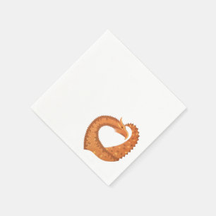 Burnt orange heart dragon on white napkin
