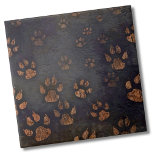 Burnt Paw Prints Dark Pattern Tile<br><div class="desc">The captivating paw print pattern in this design appears as if the wood has been meticulously etched around each paw, resulting in a distinctive blend of bold black outlines against a neutral backdrop. This striking interplay of mixed paw prints adds a touch of rustic charm to the overall aesthetic. Whether...</div>