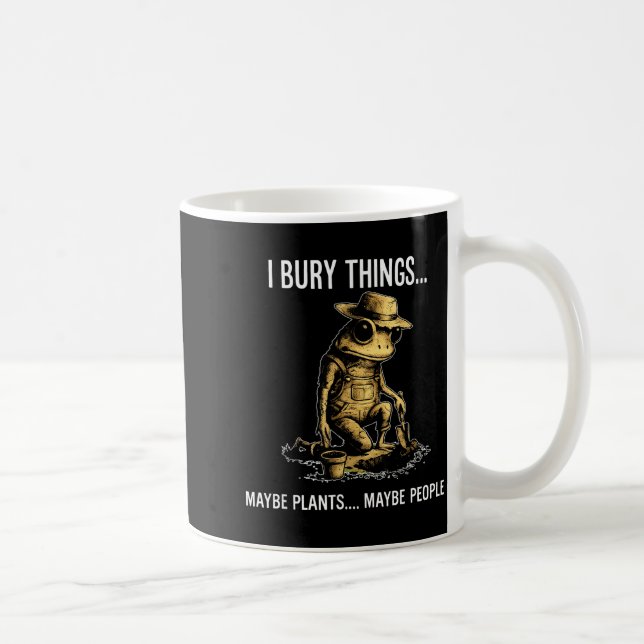Bury things maybe plants maybe people funny frog coffee mug (Right)