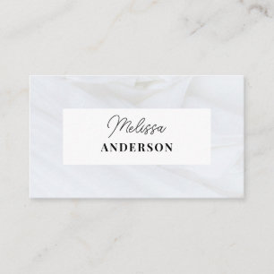 Business card with white background.