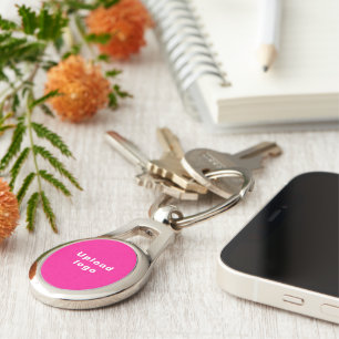Business Logo With Pink Background on Oval Metal Key Ring