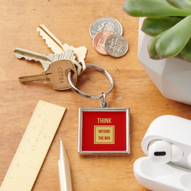 Business quote think outside the box red key ring (Desk)