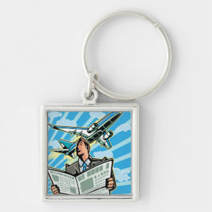 Businessman with newspaper and aeroplane above key ring