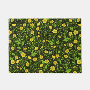 Buttercups on black doormat