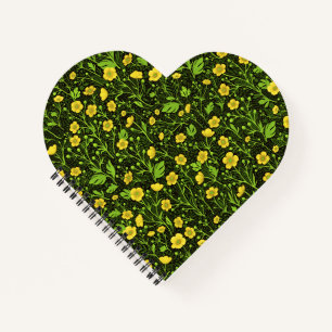 Buttercups on black notebook