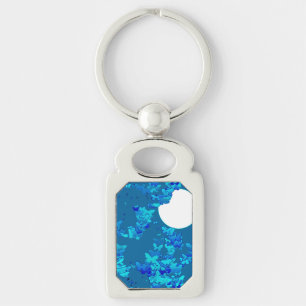 Butterflies against blue night sky, moonscape key ring