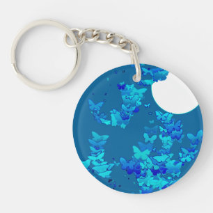 Butterflies against blue night sky, moonscape key ring