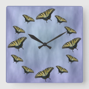 Butterflies in the clouds. square wall clock