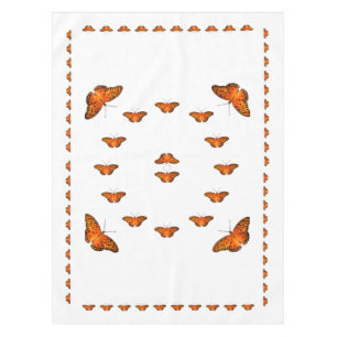 Butterflies on white tablecloth