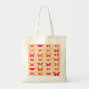 Butterflies, soft orange, coral pink, gold tote bag