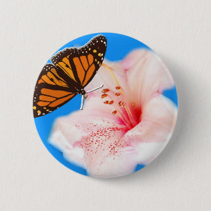 butterfly and flower 6 cm round badge