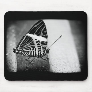butterfly crossing mouse pad