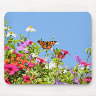 butterfly on flowers and blue sky mouse pad
