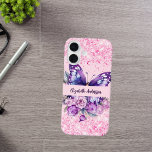 Butterfly pink purple flowers iPhone 16 case<br><div class="desc">A girly pink background decorated with a purple butterfly,  pink and purple flowers,  pink confetti. Personalise and add your name.</div>
