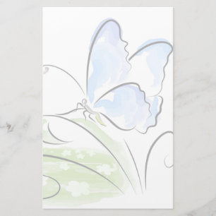 Butterfly sitting on grass over flower field stationery
