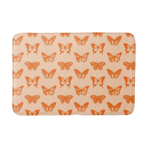 Butterfly sketch, coral orange bath mat