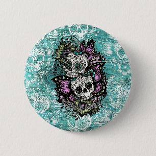 Butterfly sugar skulls illustration in blue. 6 cm round badge