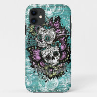 Butterfly sugar skulls illustration in blue.