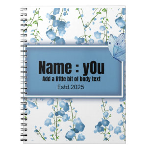 butterfly surrounded by blue shrubs notebook