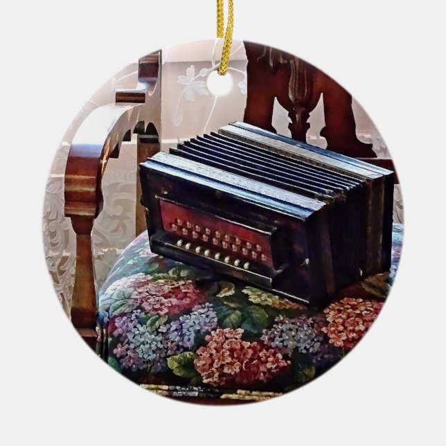 Button Accordion on Chair With Flowered Seat Ceramic Tree Decoration (Front)