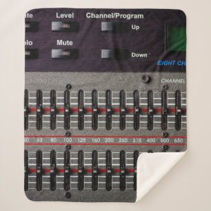Buttons on a sound mixer in a recording studio. sherpa blanket