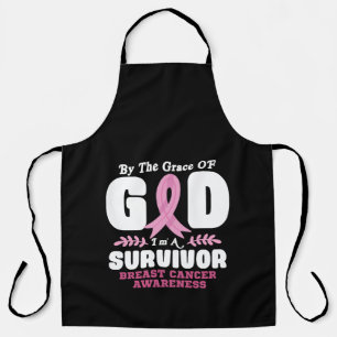 By The Grace God Im A Survivor Breast Cancer Apron