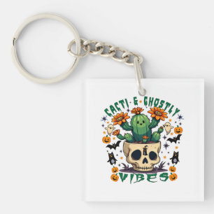 Cacti & Ghostly Vibes: Spooky Pumpkin Design Key Ring