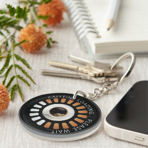 Caffeine loading key ring