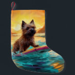 Cairn Terrier Beach Surfing Painting Small Christmas Stocking<br><div class="desc">Immerse yourself in the playful world of canine adventure with this captivating painting. A spirited dog takes to the waves, skilfully riding the surf on a sun-kissed beach. The vibrant artwork beautifully captures the essence of beachside excitement as the dog fearlessly rides the waves, embodying the spirit of fun and...</div>