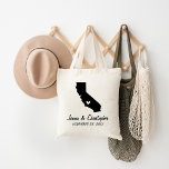 California Wedding Welcome Tote Bag<br><div class="desc">Welcome out of town wedding guests with a bag full of snacks and treats personalised with the state where you're getting married and the bride and groom's names and wedding date. Click Customise It to move the heart to show any city or location on the state map. Need a different...</div>
