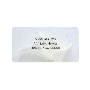Calla lilies on decorative background fade label