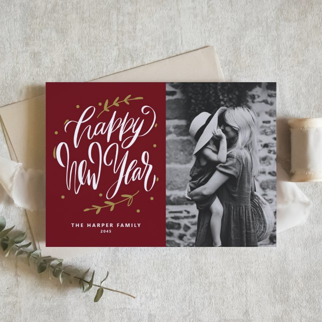 Calligraphy and Wreath New Year Photo Burgundy Holiday Card (Customizable burgundy photo Happy New Year card featuring modern calligraphy and wreath.)